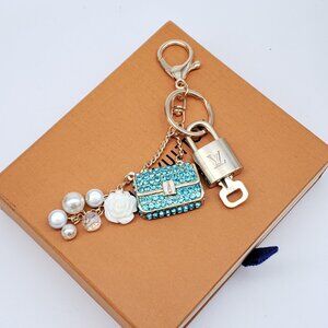 Authentic Louis Vuitton Gold Lock & Box w/ Unbranded Bag Bagcharm